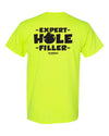 Back of the safety-green Expert Hole Filler HoleMole T-shirt, sizes L and XL.
