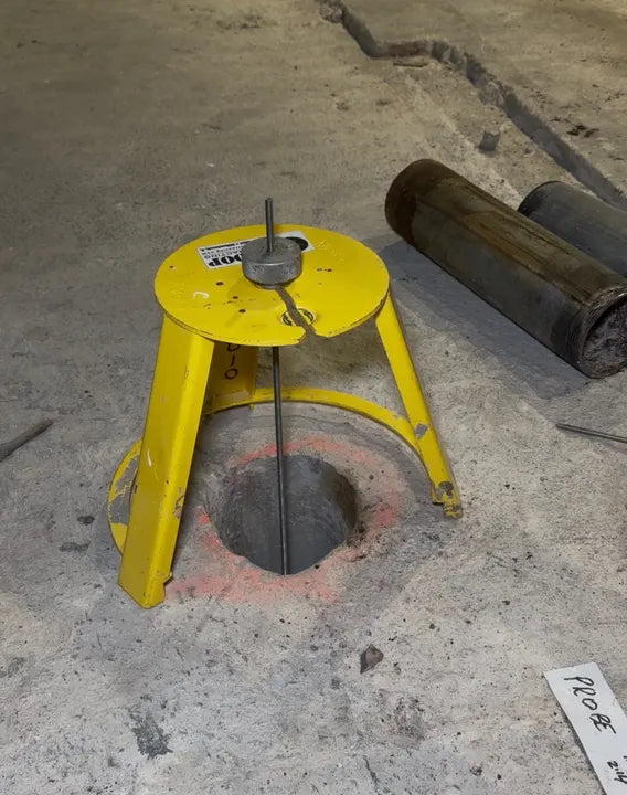 HoleMole Stand set over a core hole on a Troop Contracting jobsite